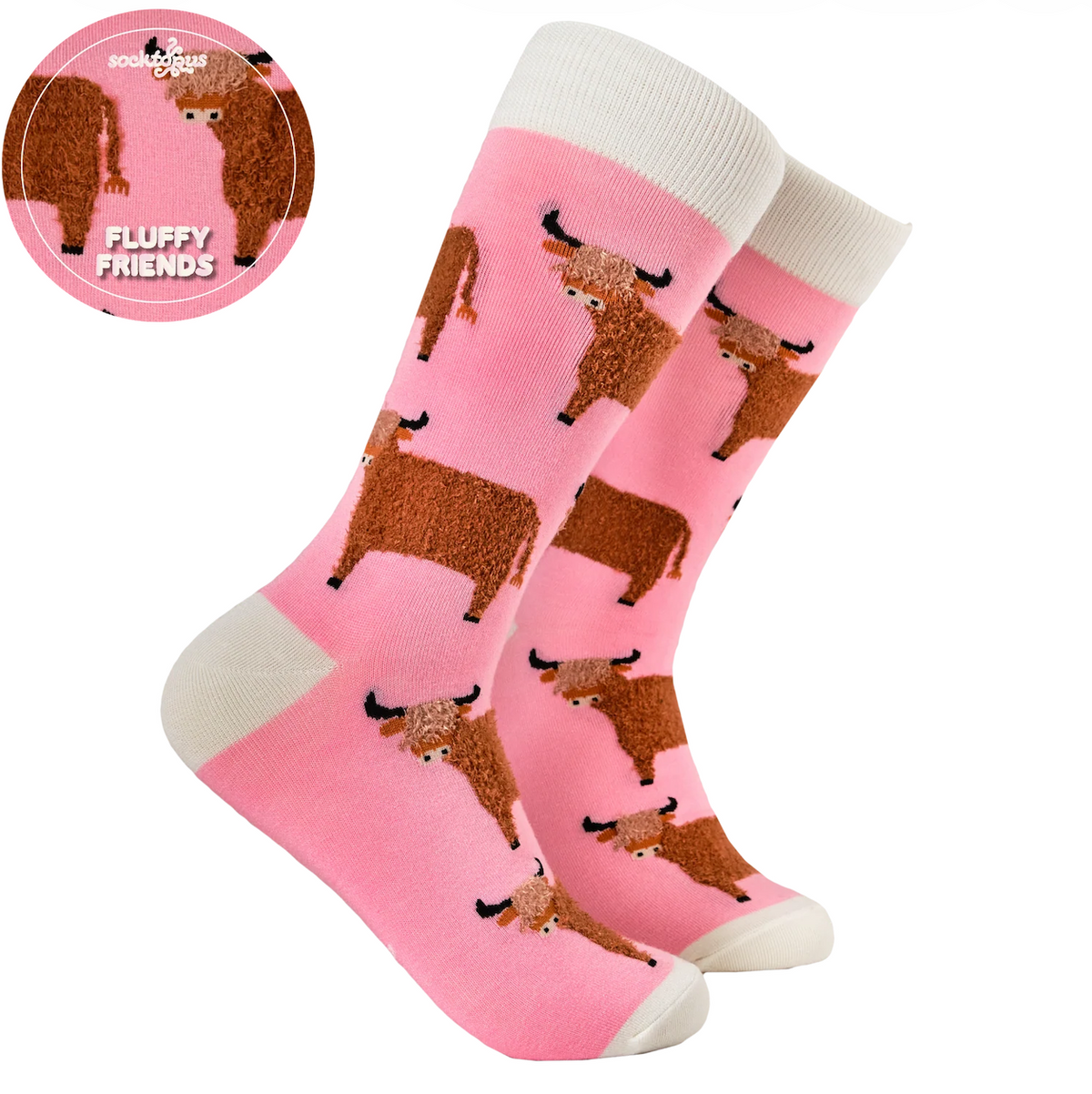 Pink crew socks with a repeating pattern of fluffy brown Highland cows, featuring white ribbed cuffs, heels, and toes. A circular inset in the top-left corner shows a close-up of the cow texture with the text 'FLUFFY FRIENDS' and 'socktopus'