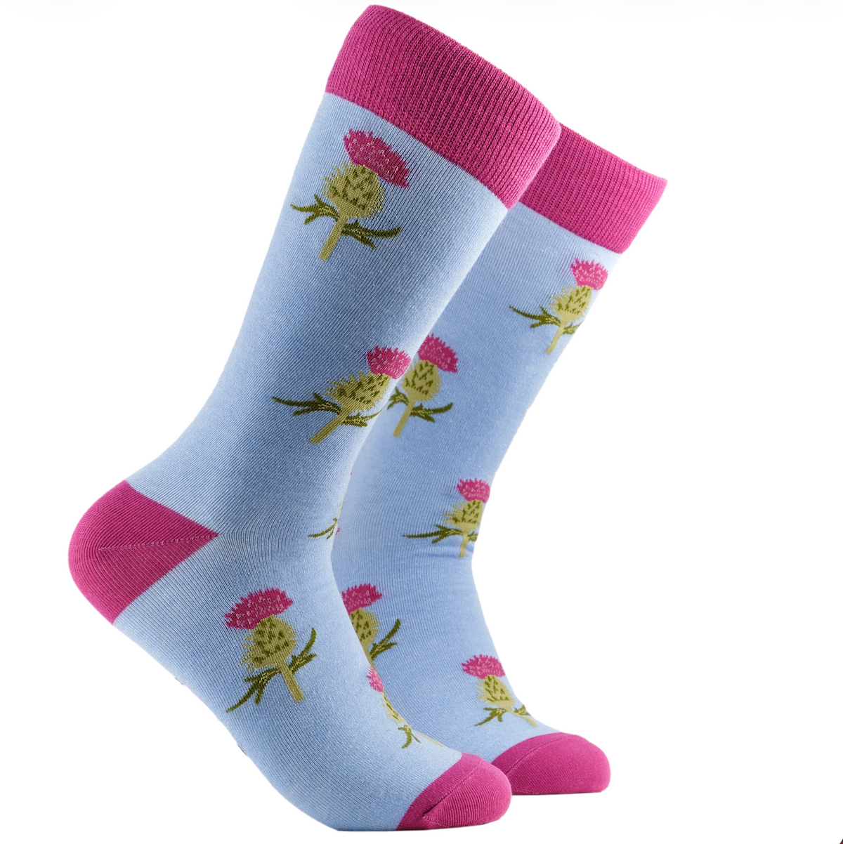 A pair of light blue crew socks with pink cuffs, heels, and toes, decorated with a pattern of pink thistle flowers with green stems.