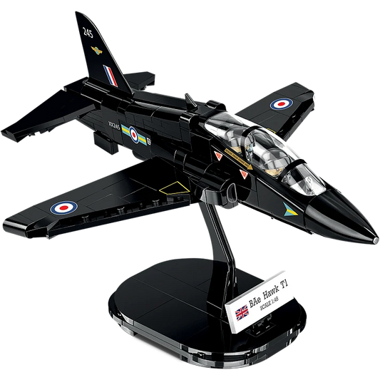 A photo of the assembled model plane, stood on its black display stand. The jet consists of various black blocks, and features a transparent cockpit wind shield. A small white plaque displaying the aircraft’s name and country of origin sits on the display stand. 