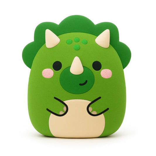 A green cartoon triceratops plushie with cream-colored horns and belly, pink cheeks, and black facial features, shown on a plain white background.