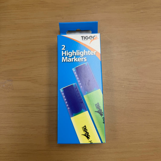 A blue Tiger Stationery Box with a picture of 2 highlighter pens, one yellow and one green.