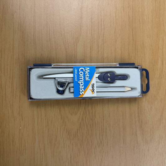 A plastic box containing a metal maths compass and pencil, displayed ion a wodden background. 
