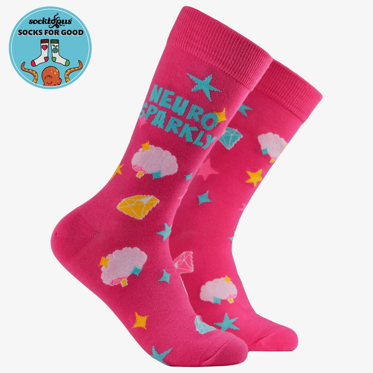 A pair of bright pink crew socks with a playful pattern of pastel brains, stars, diamonds, and the words 'NEURO SPARKLY' in teal. A circular 'socksforgood' brand logo is visible in the top-left corner against a clean white background.