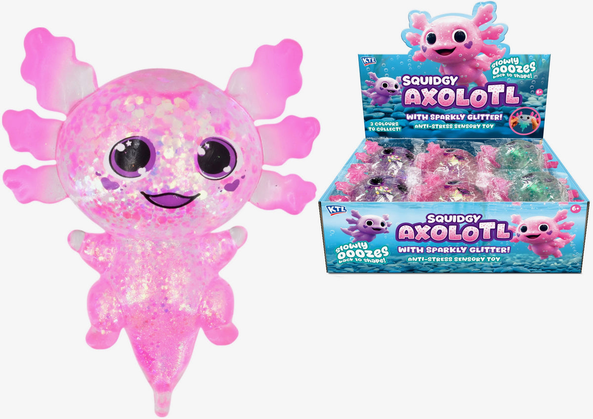 A pink glittery axolotl toy shown next to its retail display box. The toy features a round, bubbly body with four flapping limbs, large cartoon eyes, and a smiling mouth.