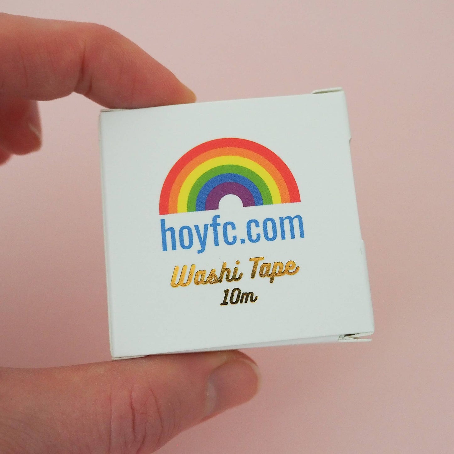 A roll of Washi tape in the white dispenser box, with the hoyfc.com logo